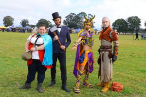 Four cosplayers with different costume styles