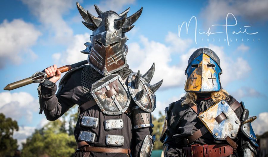 Two guests in armoured medieval costumes at Winterfest